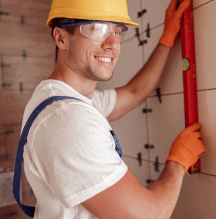 Smiling Swansea tiler hard at work.